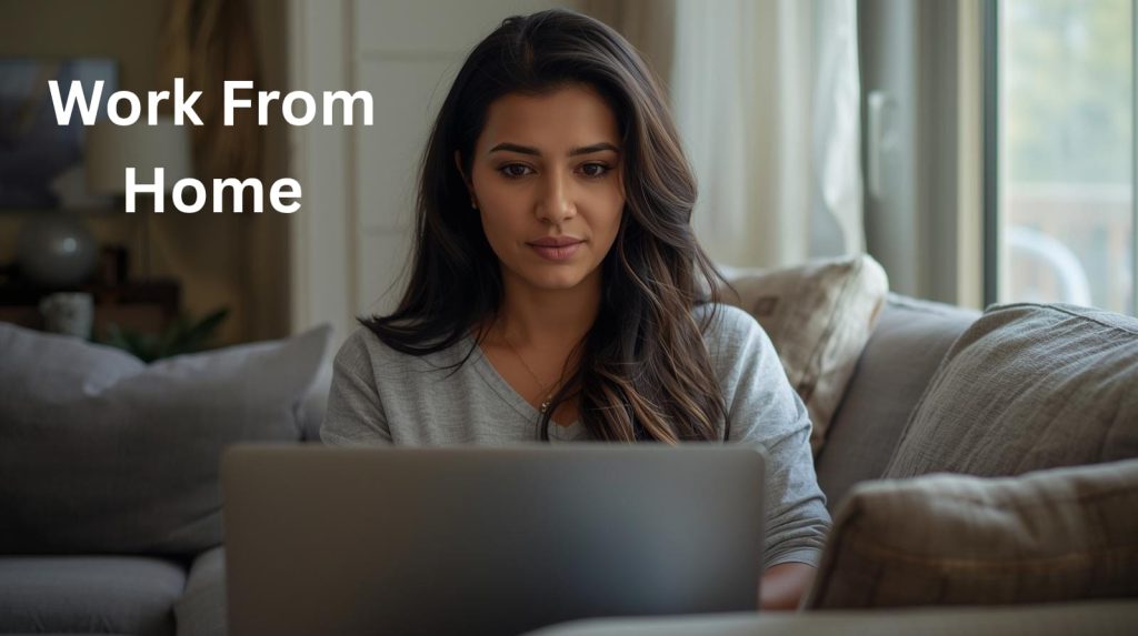 A woman with long dark hair sits on a gray couch working on a laptop. Text in the upper left corner reads "Work From Home".