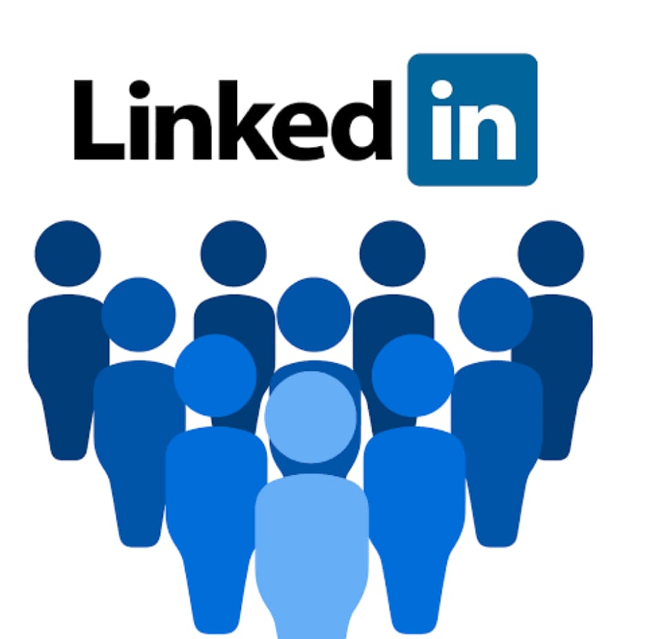 The image shows the LinkedIn logo along with a graphic of people.

- The LinkedIn logo is at the top with "Linked" in black text and "in" in a blue square.
- Below the logo, there's a group of blue silhouettes representing people.
- The silhouettes are in various shades of blue, with one in light blue at the front center.
- The background of the image is white.